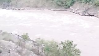 Girl on river swimming