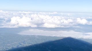 the blue sky, the white clouds, and the height of Mount Merbabu, Indonesia