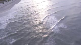 Aerial Of Beach At Sunset