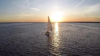 Sailboat sunrise HD video