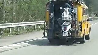 human transportation that carries motorbikes and their riders