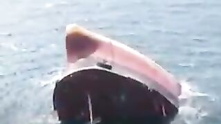 Video_monitors_the_moment_of_a_ship_attacked_by_the_Houthis_sinking_in_the_Red_Sea