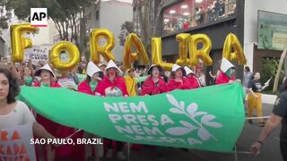 Outraged Brazilian women stage protests against bill to equate late abortions with homicide.