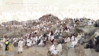Muslim pilgrims converge on Mount Arafat for holiest day of Hajj.