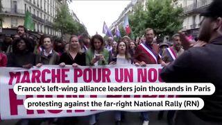 French left-wing leaders join anti-far-right protest in Paris _ REUTERS.