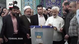 Iran to hold runoff presidential election between a reformist and a hard-liner after low turnout