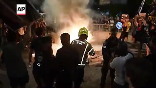 Police push back some protesters in Tel Aviv, Israel demanding new elections and Gaza hostages deal