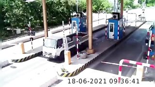 Container truck driver crashed into toll station
