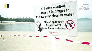 Singapore races to clean up oil spill on Sentosa island