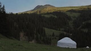 Nomadic Life of a Large Family in Yurt House in Kyrgyzstan Highlands