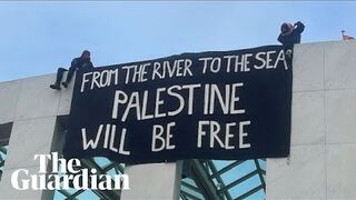 Pro-Palestine protesters hang banners from Parliament House roof in Canberra