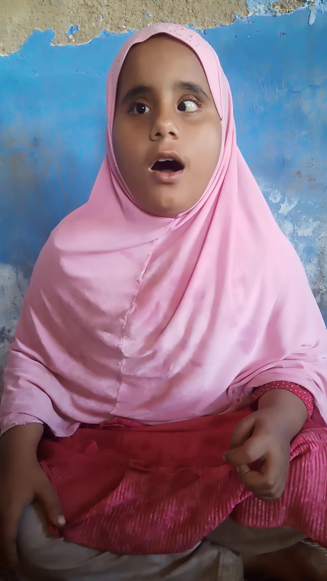 Blind girl reciting Quran - Febspot