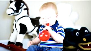 Baby Boy Playing Toys Horse