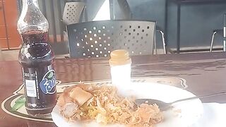 '' A MEAL OF PILAU SERVED WITH SODA"