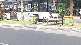 electric bus in an upscale residential area