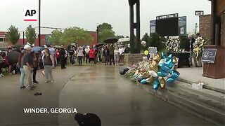 Senator Raphael Warnock speaks at vigil mourning Georgia school shooting victims