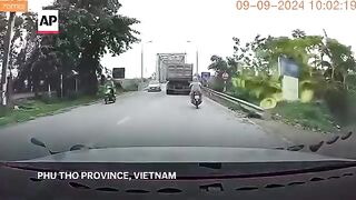 Dashcam video shows moment bridge collapses in Vietnam, killing 64