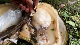 River Adventure: Girl Discovers a Unique Pearl Inside a Clam