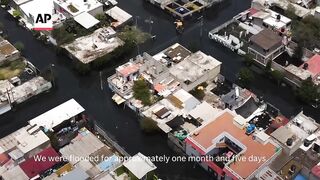 After over a month of living in black sewage waters, residents of Mexico's Chalco remain anxious.