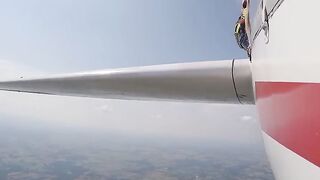 Adventurous Skydiver Sits on Plane’s Wing