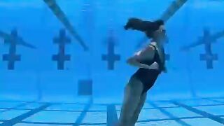 Underwater dancer Kristina Makishenko shows off her upside-down moonwalk- she did not come to play????