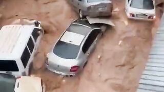 flash floods swept away luxury cars and nearby residences