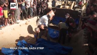 Bodies of 88 Palestinians buried after being returned to Gaza by Israel.