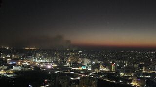 Smoke rises over Beirut suburbs after massive Israeli strike .