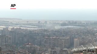 Smoke seen rising into Beirut skyline.