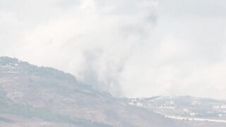 Columns of smoke rise over both sides of the Israel-Lebanon border _ AFP.