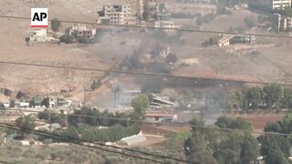 Explosions and rising plumes of smoke across Lebanon.