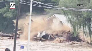 House swept away amid flooding in North Carolina after Hurricane Helene.