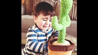 babies reaction to a toy cactus that copies sounds