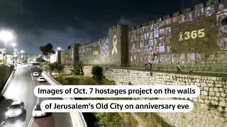 Oct. 7 hostage images light up Jerusalem _ REUTERS.