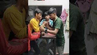 Two crazy boys fight in arm wrestling