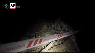 Ukrainian emergency workers search rubble after Russian airstrike on Zaporizhzhia (1).