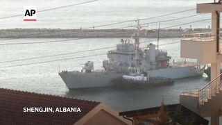 First migrants arrive in Albania on Italian navy ship as part of new agreement.