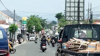 atmosphere of the main road in front of the Purwantoro Wonogiri Indonesian market