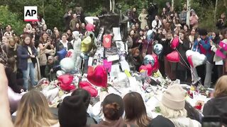 Hundreds of Liam Payne fans gather for London vigil.