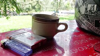 Enjoy a cup of coffee in a green plantation - Puncak,bogor - Indonesia