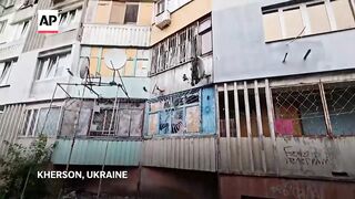 Aftermath of Russian strike on building in Kherson, Ukraine, killing 5.