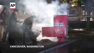 Fires at ballot boxes in Oregon and Washington are connected, police say.