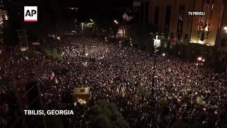 Tens of thousands rally in Georgia to denounce election they say was rigged .