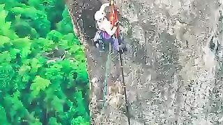 Riding a Sky High Cliff