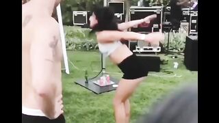 Girl does a back flip and split at the same time!