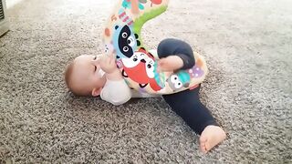 Baby Kid Playing on the Floor