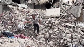 Desperate for cash, Gazans sell clothes plucked from rubble