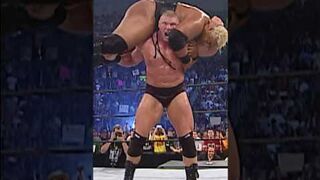 Brock Lesnar lifts a 350-pound Rikishi with ease