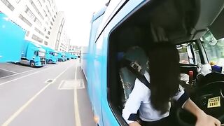 Female reversing a huge truck