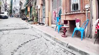 Most of the seats outside stylish cafes are shared with cats.